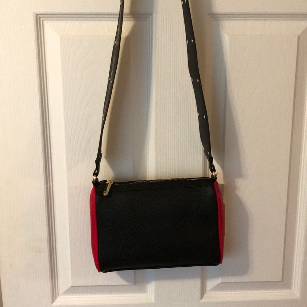 NWT Crossbody with lovely strap design